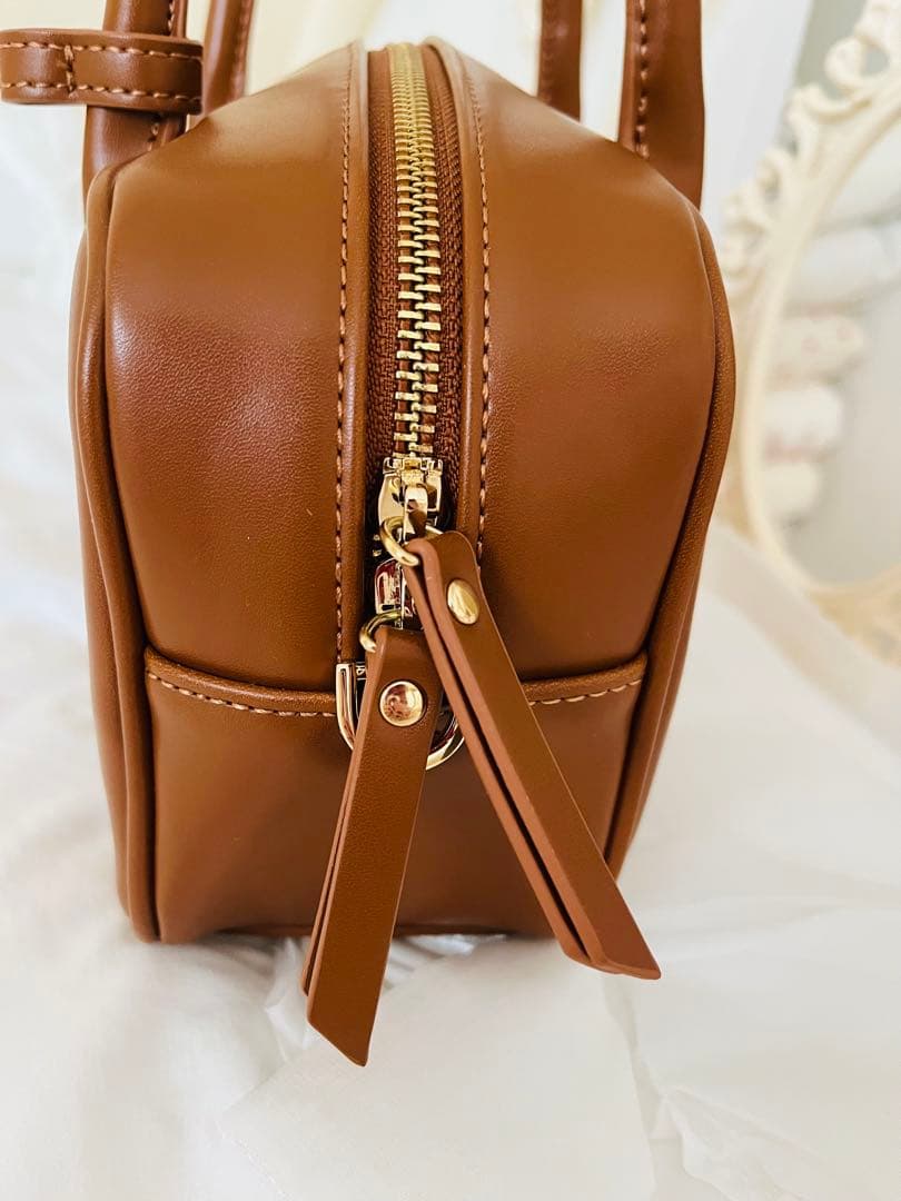 スナイデルエンボスロゴバッグブラウン美品