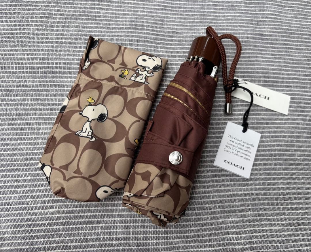 新品　COACH ピーナッツ　スヌーピー　折りたたみ傘　シグネチャー