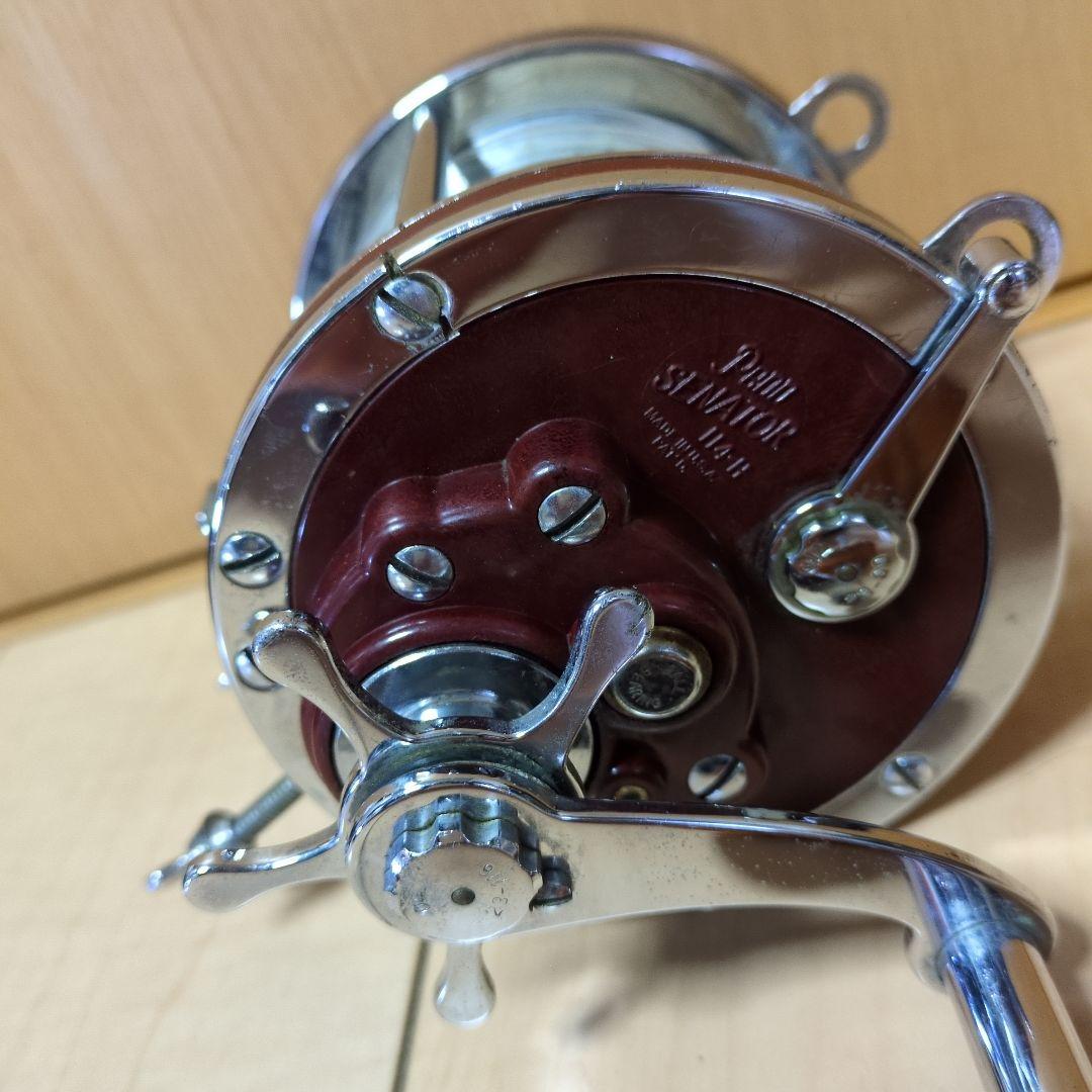 1000 THRUST 両軸リール シルバー/レッド