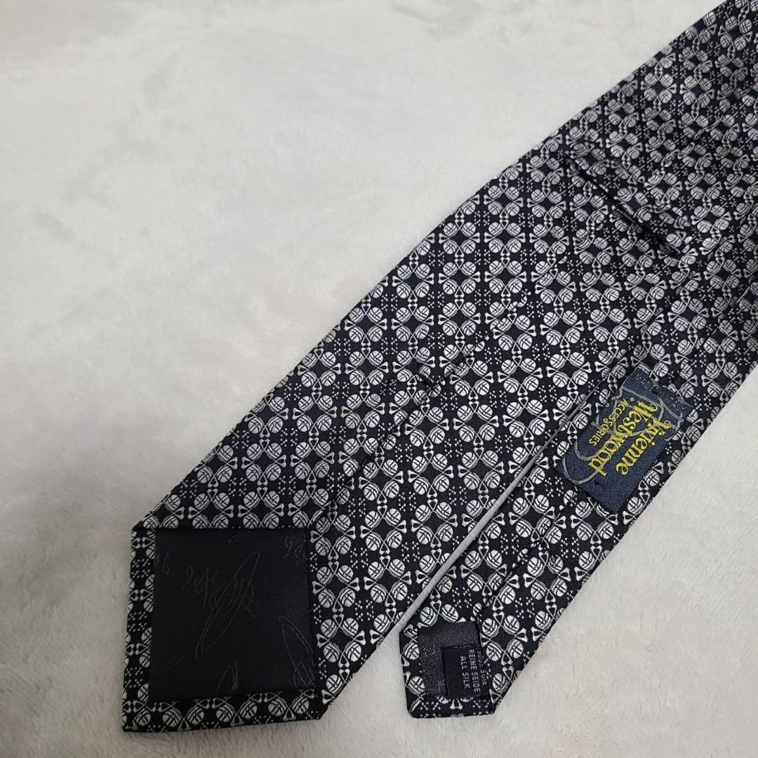 美品Vivienne Westwoodヴィヴィアン　ネクタイ　オーブ総柄　黒×銀