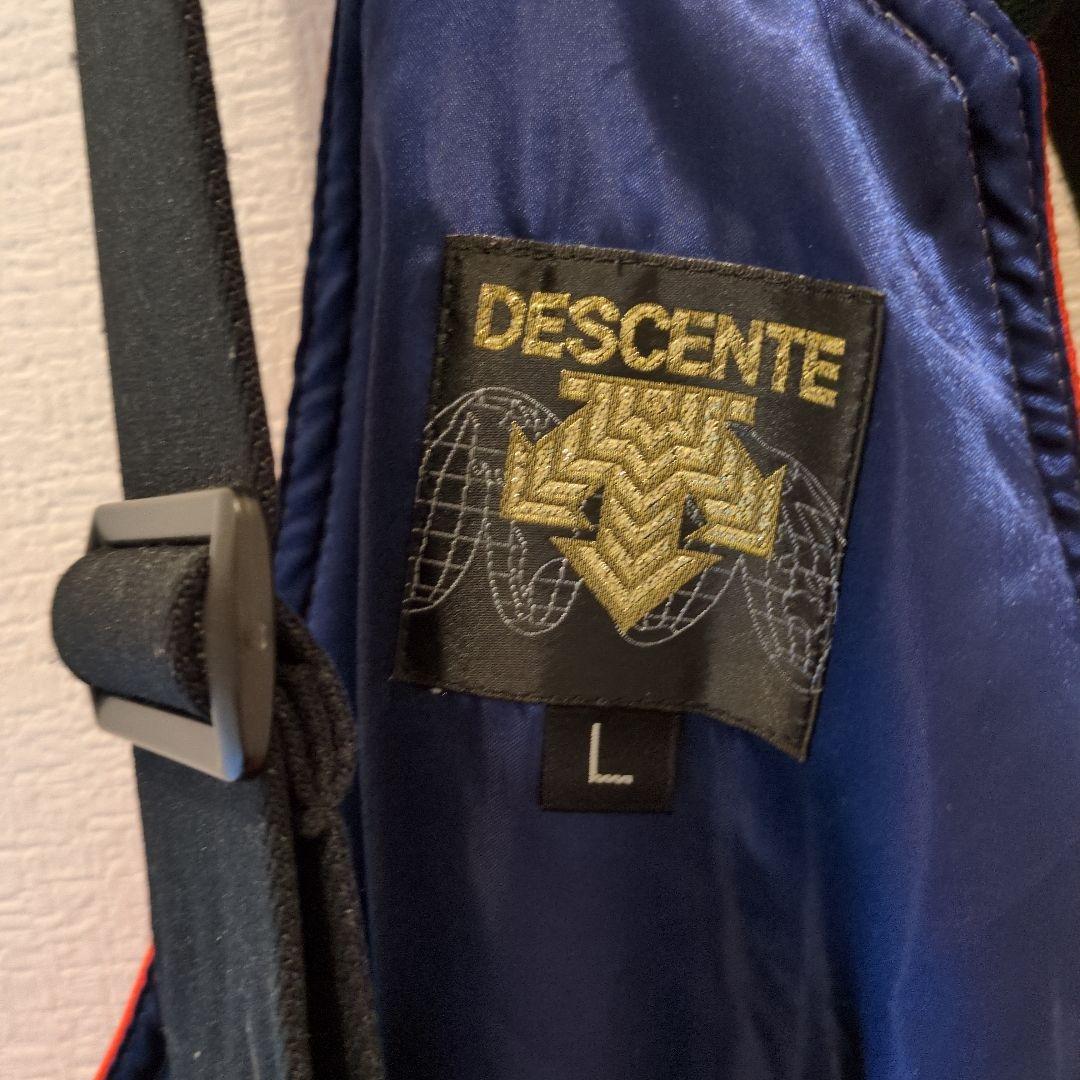 オレンジとホワイトのスキーウェア上下