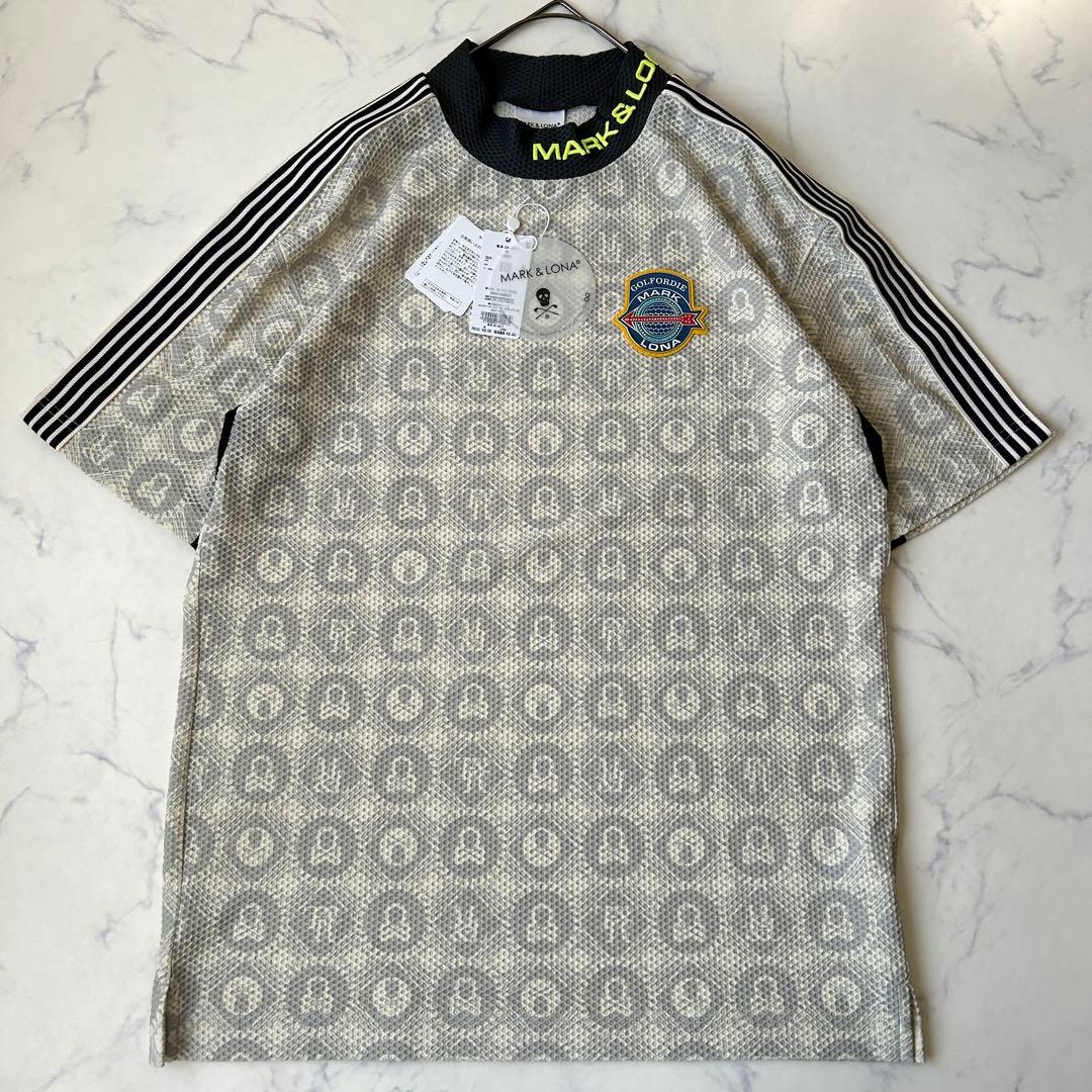 マークアンドロナ 2025年モデル モックネック 総柄 ラバーロゴ タグ付き