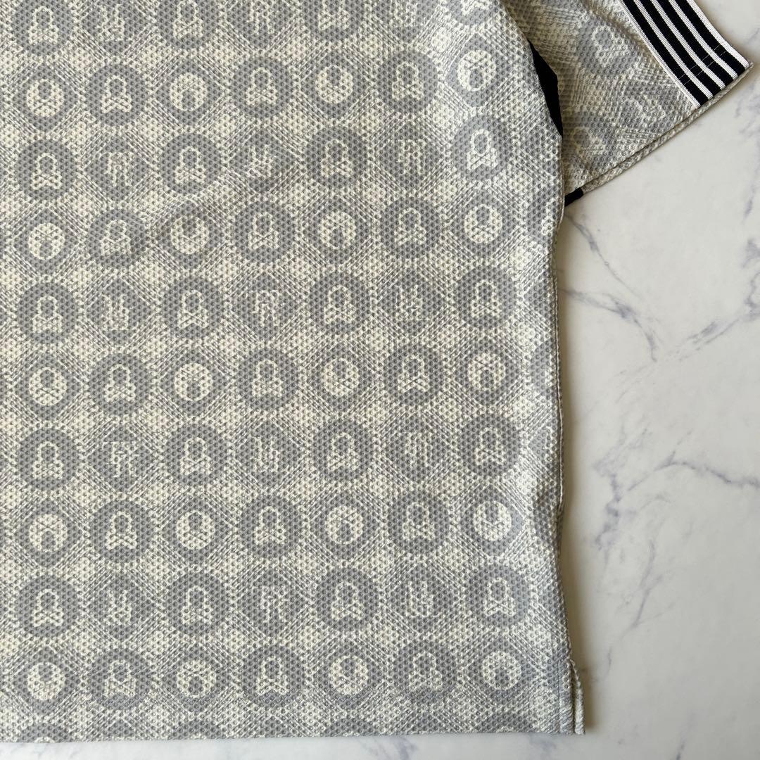 マークアンドロナ 2025年モデル モックネック 総柄 ラバーロゴ タグ付き