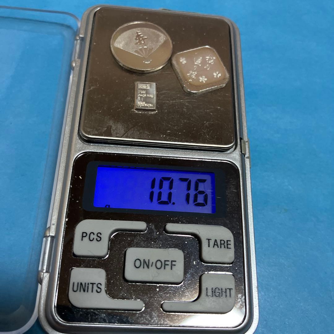 銀インゴット1点純銀メダル2点銅年銘板1点