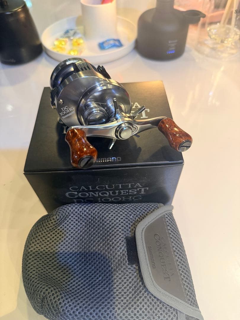 20カルカッタコンクエストDC100HG中古実釣5回ほどフィールド使用カスタム有