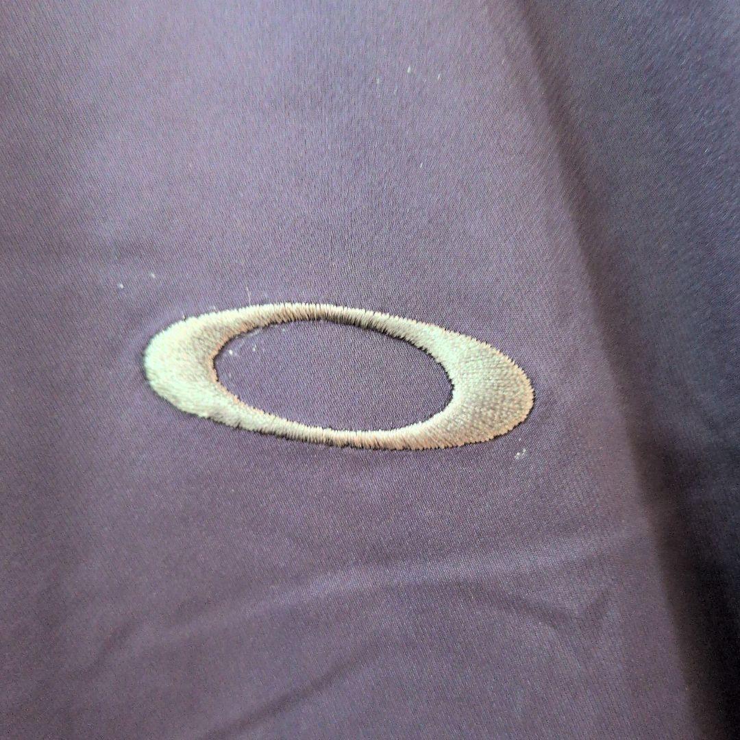 新品タグ付オークリー　ゴルフ　ウィンドブレーカー　XL パープル