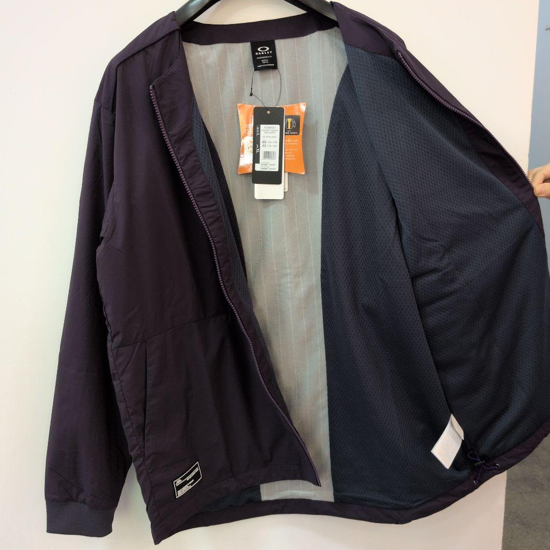 新品タグ付オークリー　ゴルフ　ウィンドブレーカー　XL パープル