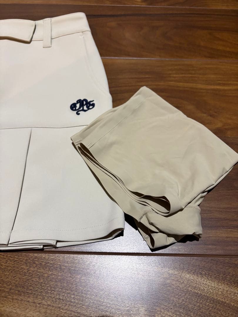 CPG アイボリー プリーツスカート レディース ゴルフ