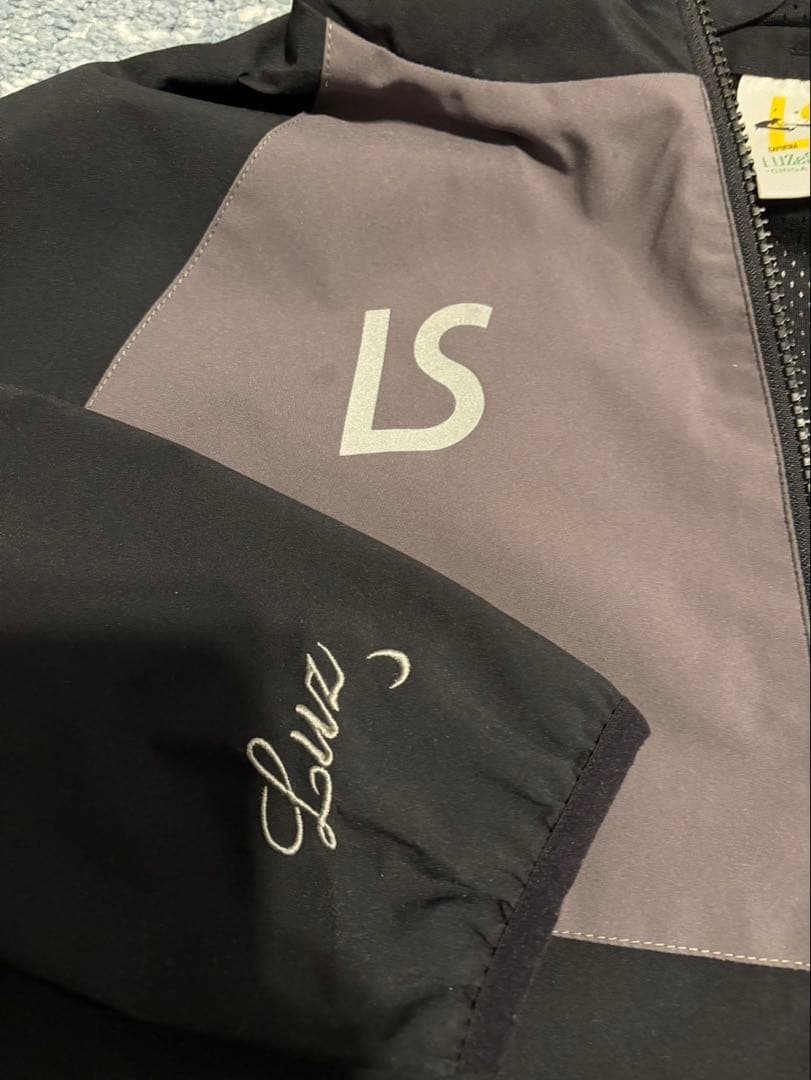 ルース　フード付きピステ・ウィンドブレーカー