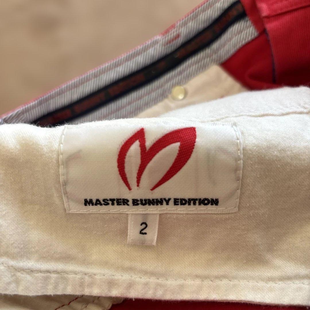 パーリーゲイツ　ロゴ長袖モックネック1紺とマスターバニー　ロゴ赤スカート2