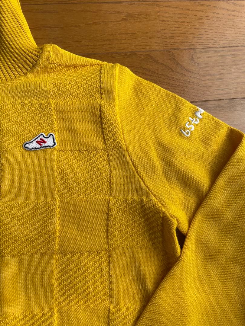 ニューバランス　イエロー チェック柄 ハイネックセーター