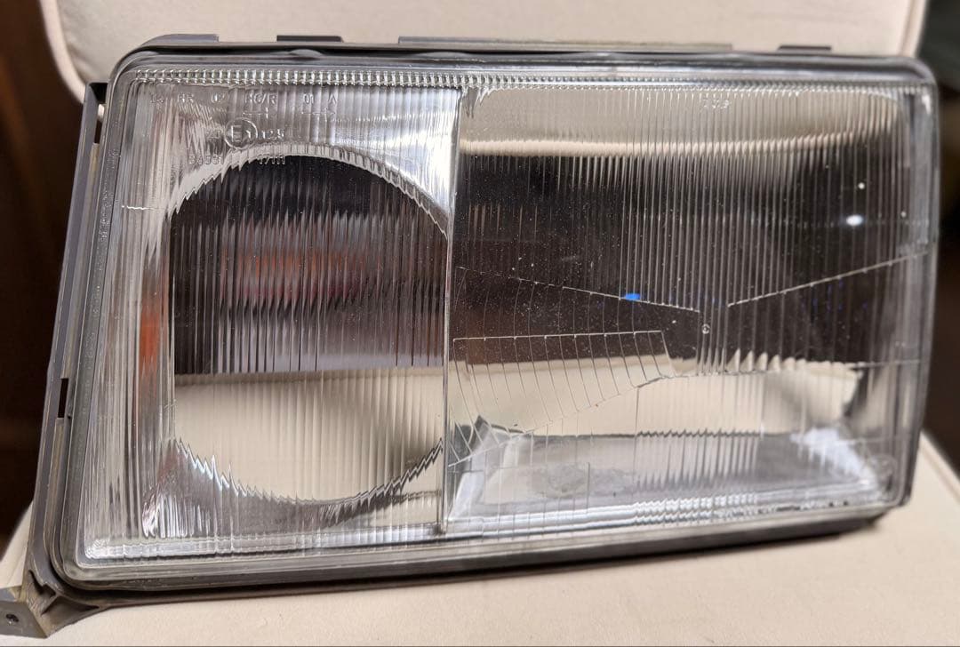 W124前期　中古レンズ左右と　前期取説