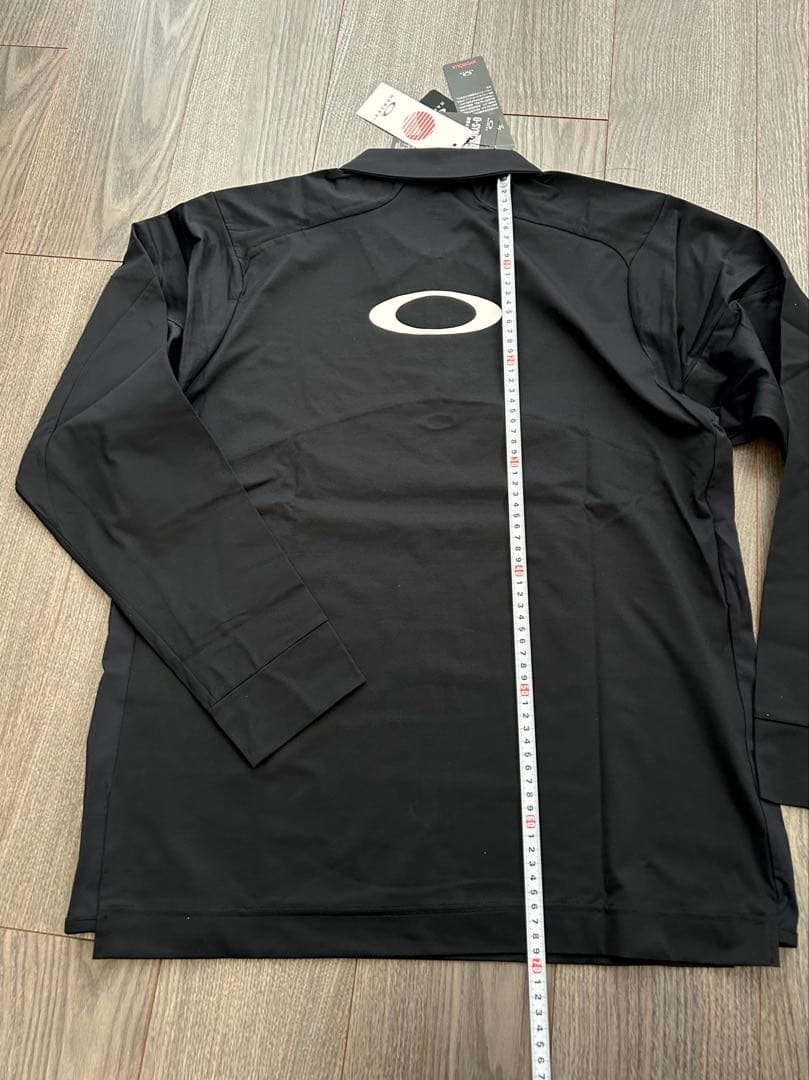 新品 OAKLEY オークリー 長袖ハーフジッププルオーバー UPF50速乾 L