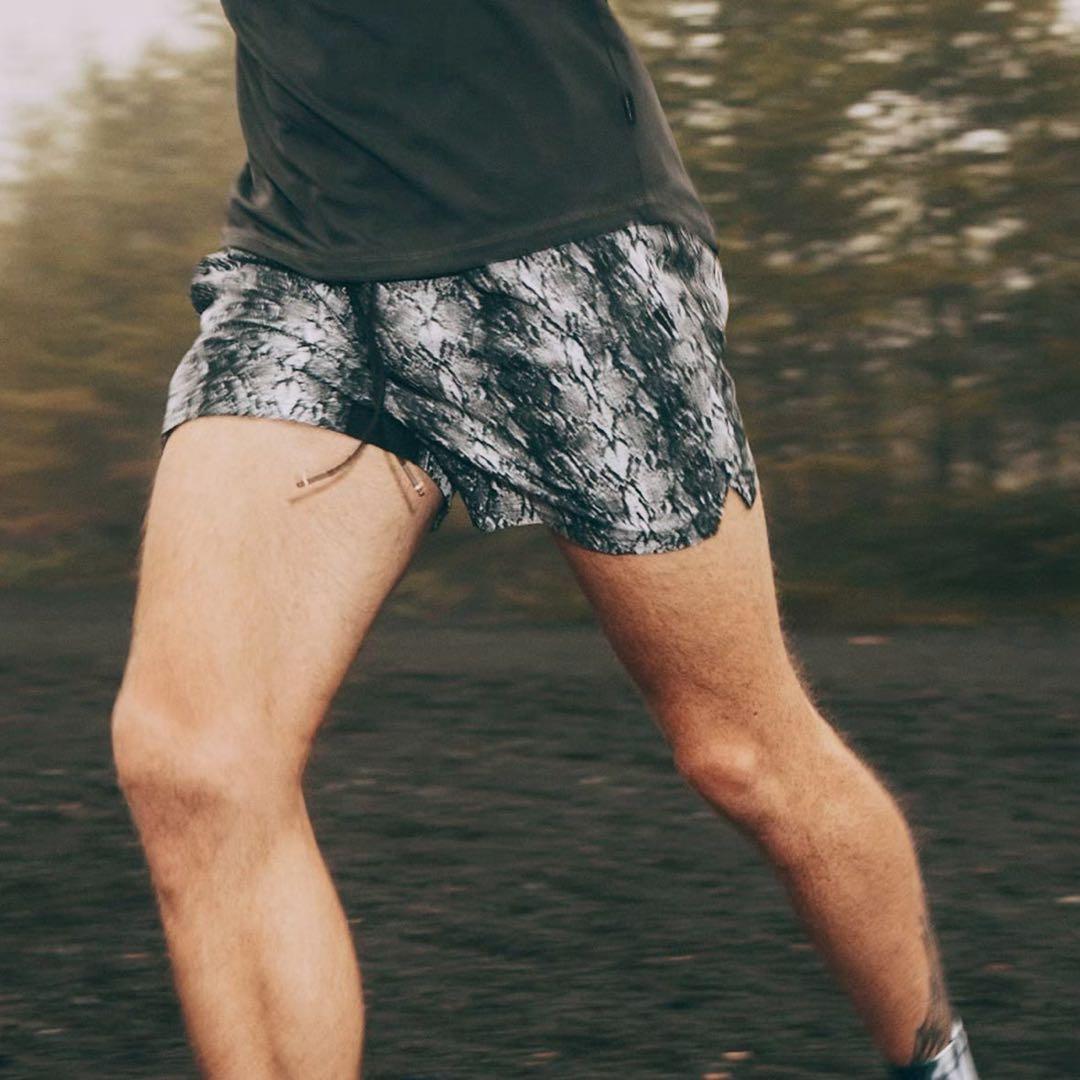 ウォーキング・ランニングウェア PYTHON PATTERN 7 POCKETS RACING SHORTS