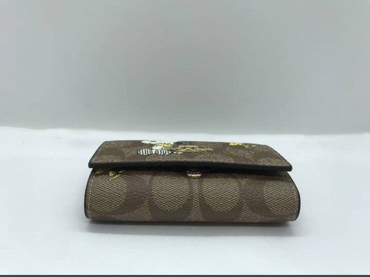 新品未使用コーチ5連キーケーススヌーピー柄ブラウンレディース送料無料即日発送