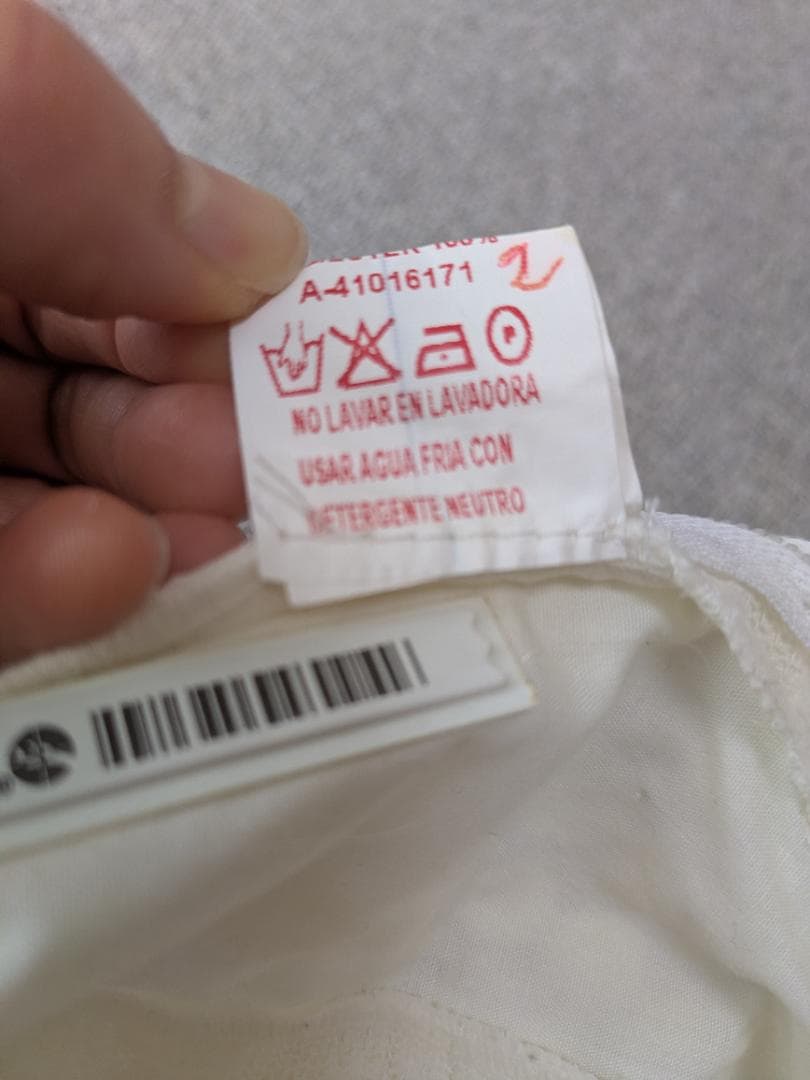 フラメンコ　アイボリー トップス