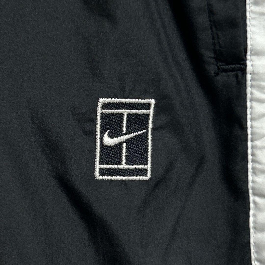 セール《美品》NIKE☆ナイキ☆ナイロンジャージ 刺繍ロゴ 側面チャック 黒/白