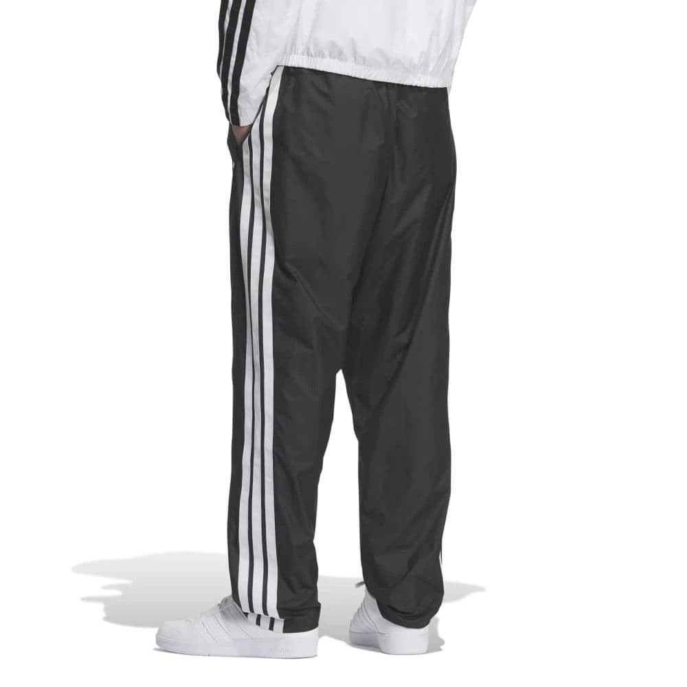 【新品】adidas ルーズフィット起毛トリコット裏地付ウィンドパンツ