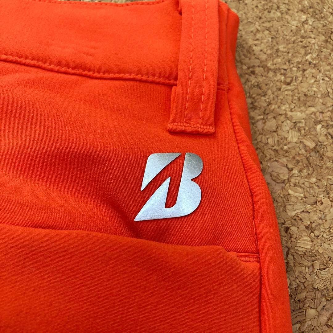 【美品】ブリヂストンTOURBゴルフウェア パンツ88cmメンズオレンジ中綿秋冬