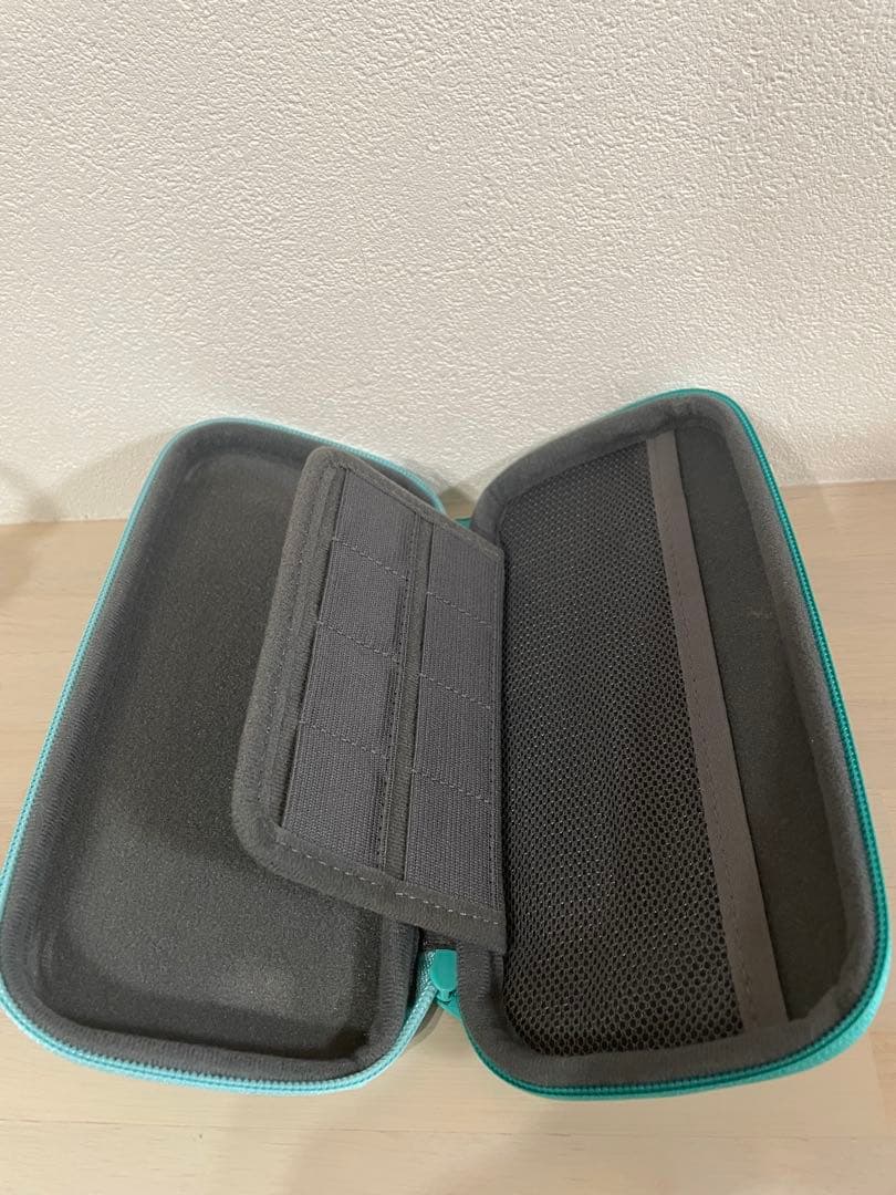 ジャンク品・Switch right 本体　コーラル （充電器、ケースつき）