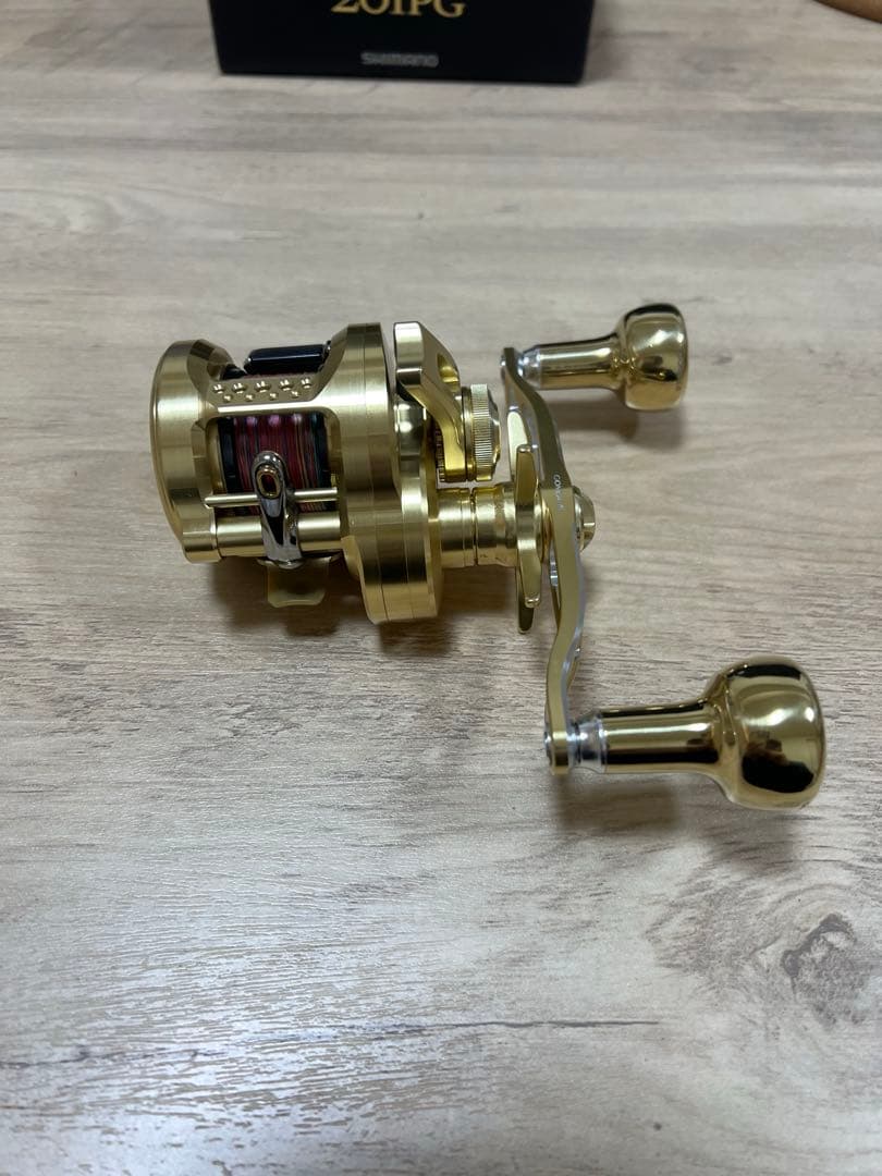 23オシアコンクエスト 201PG ゴメクサスハンドル