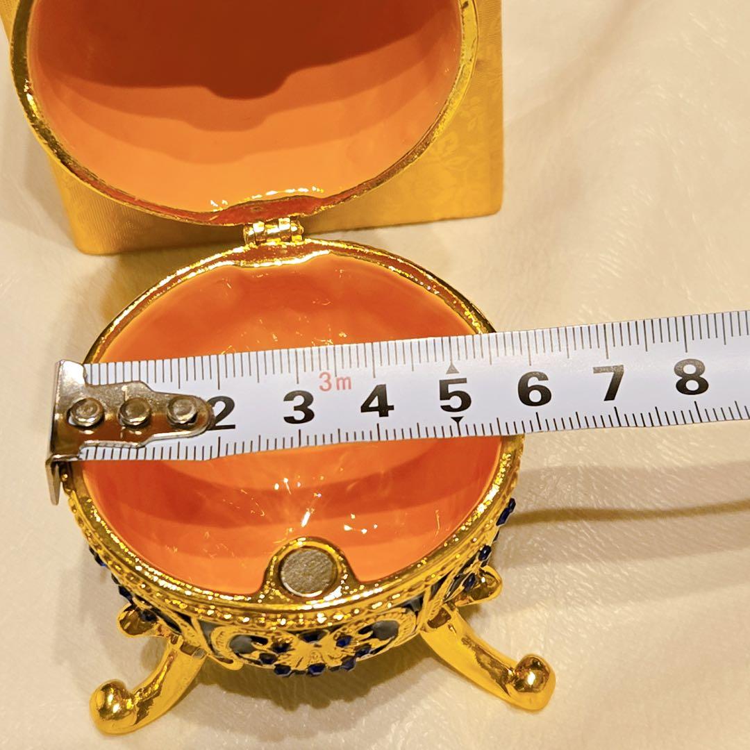 青と金の卵型小物入れ