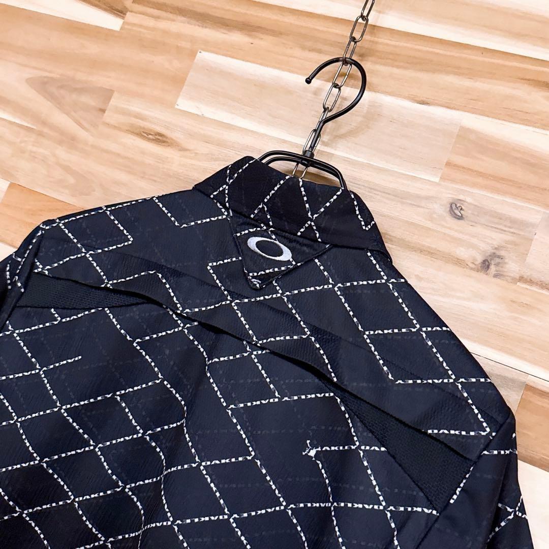 美品/廃番【オークリー】ゴルフ スカル ロゴ 半袖ポロシャツ 総柄 M 黒×白