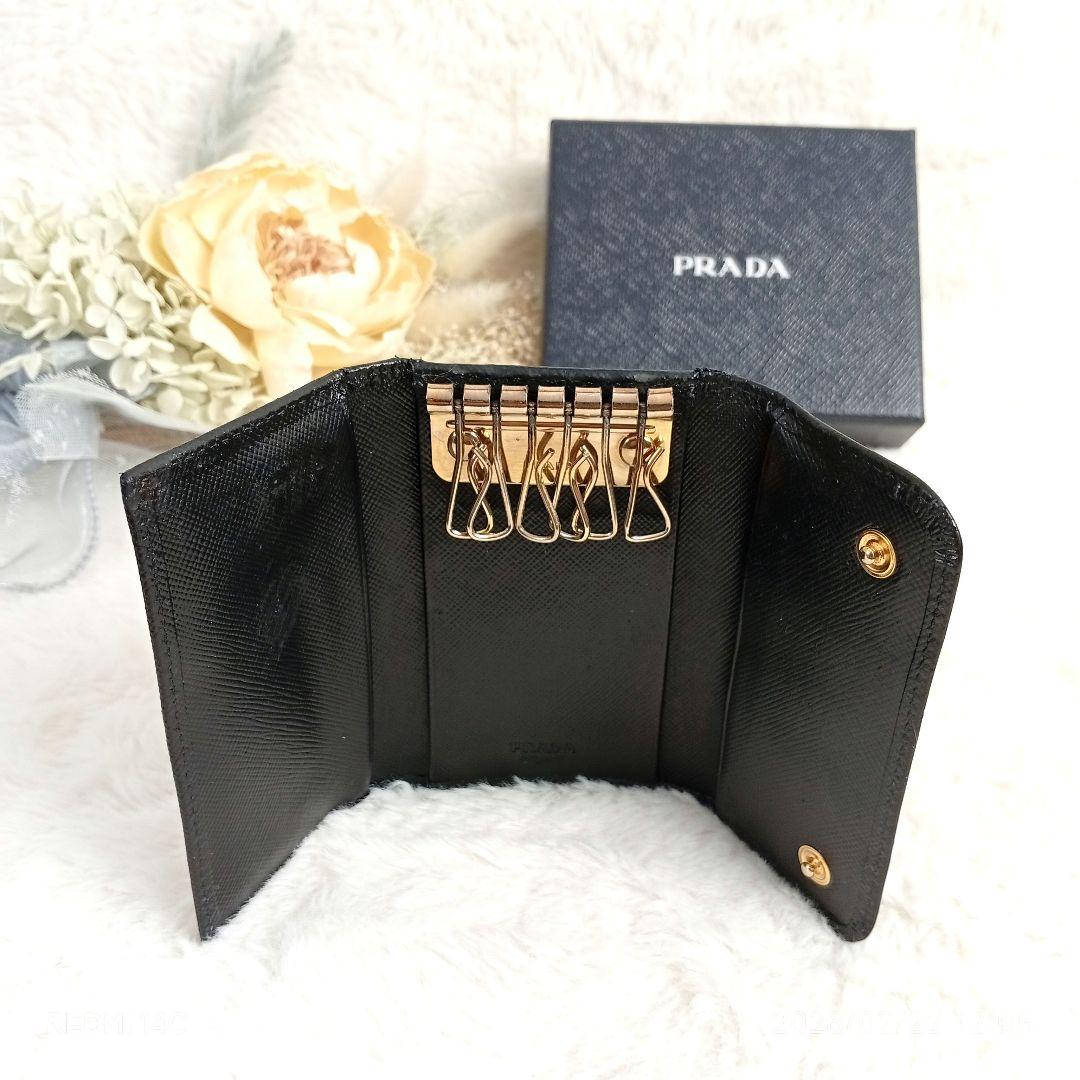 【PRADA】ゴールドロゴリボン6連キーケース ブラックネロサフィアーノレザー