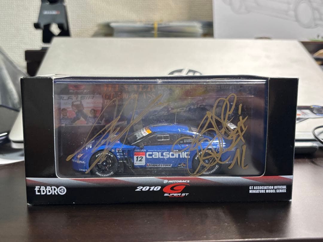 エブロ1/43 インパルカルソニックGT-R 10マレーシアRd.4優勝直筆入り