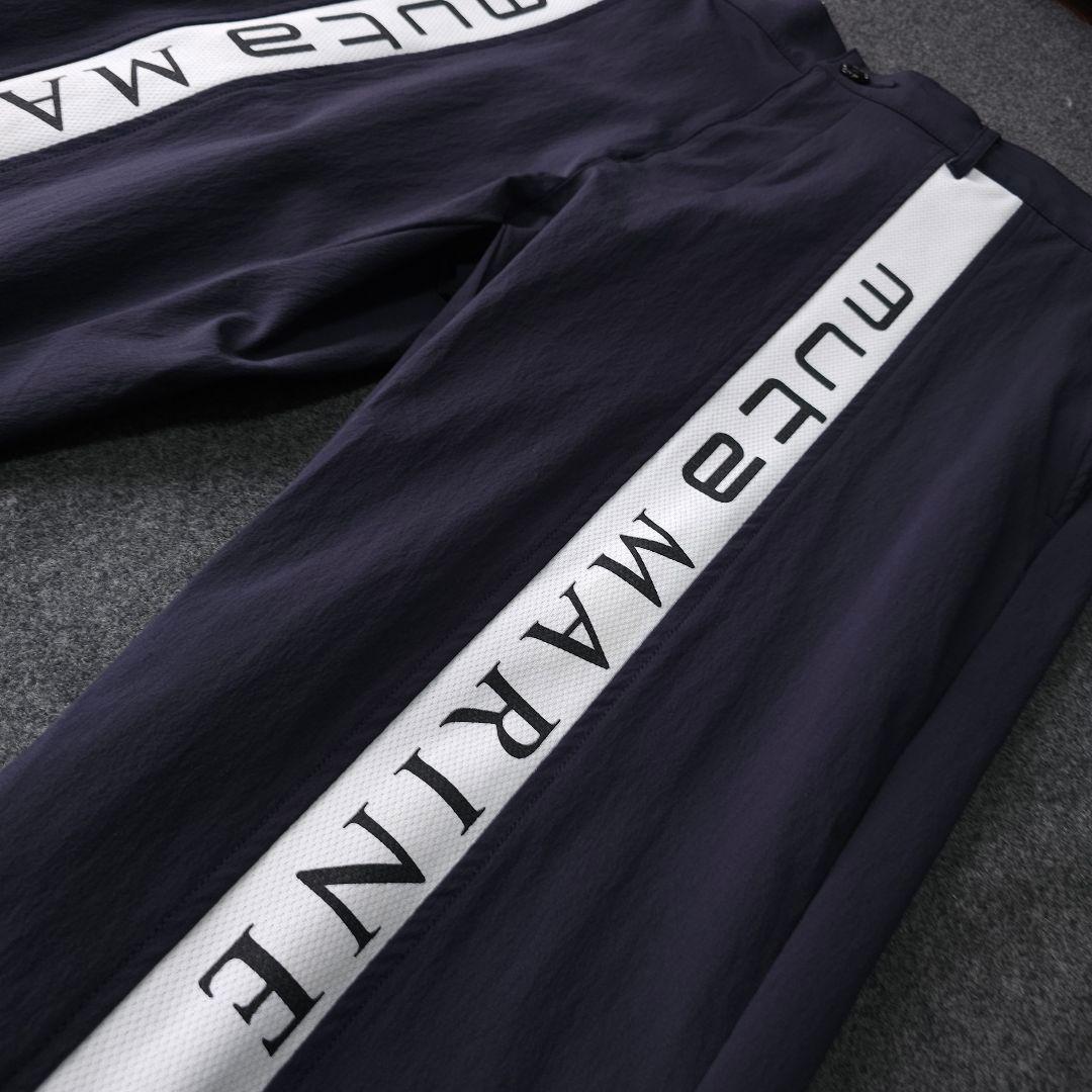 美品 ムータマリンゴルフ 春 ストレッチ素材ゴルフパンツ XL 7 ロゴネーム