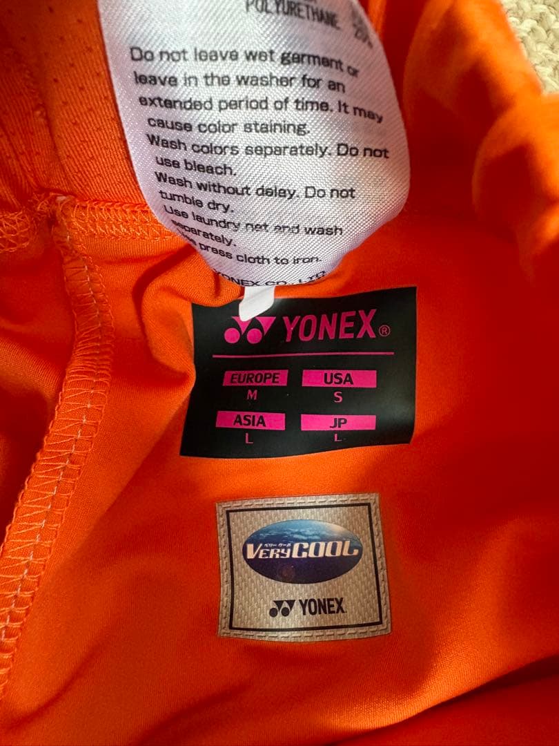YONEX VERSICOOL オレンジスカート JP L