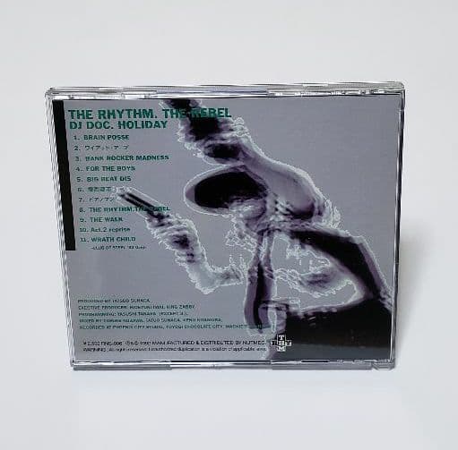 DJ DOC. HOLIDAY / The Rhythm. The Rebel