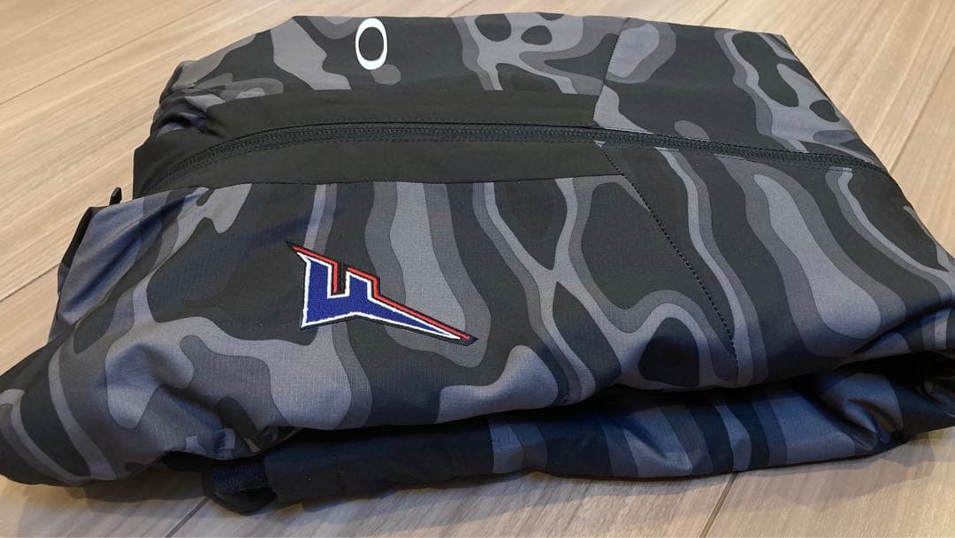 Oakley × 日本ハムファイターズ　ウィンドウォームジャケット パーカー S