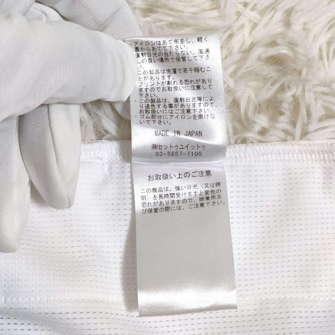 Admiral レディースS ホワイトスカート 幾何学柄 裾デザイン