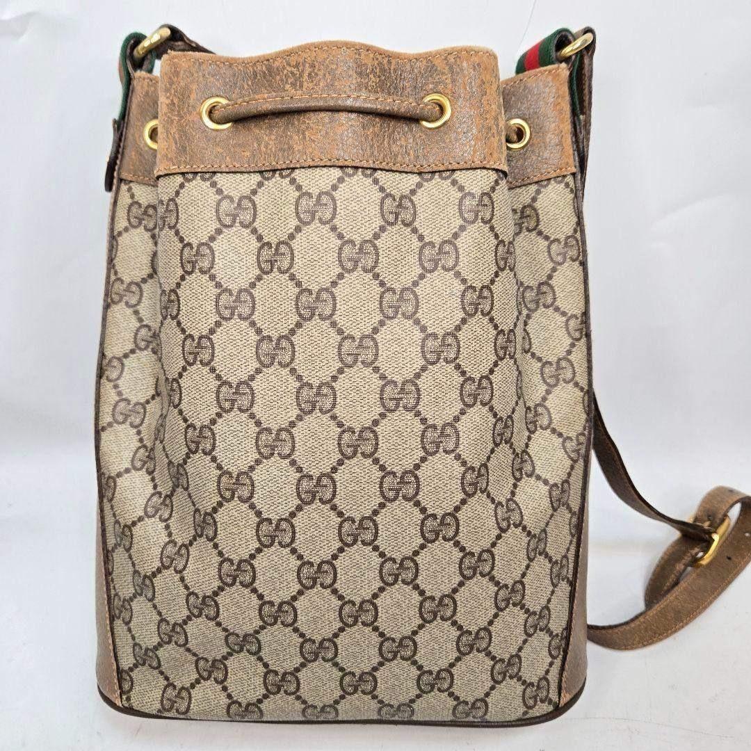 GUCCI ショルダーバッグ 巾着型 GGスプリーム シェリーライン