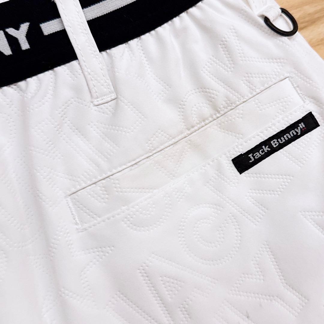 【ジャックバニー】ゴルフ デボス加工ロゴ プリーツ スカート L相当 白×黒